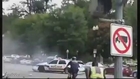 US CAPITOL SHOOTING_ Police Car Crashes trough Road Block at high speed
