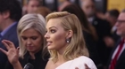 Margot Robbie Kisses and Tells Regarding Leo DiCaprio