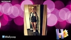 Miley Cyrus Poses Seductively In Jersey and High Heels