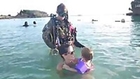 Soldier Shocks Family With Early Homecoming Scuba Surprise